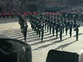 the king's guard of norway performing high precision rifle drill (music provided by the swiss army band. btw they may play well but the marching is quite sloppy and the uniforms are ridiculous: they look like doormen, not like soldiers. additionally, the   drum major's totally incapable in handling his mace.)

(basel tattoo 2008)
