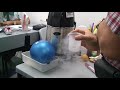 Liquid nitrogen shrinks rubber balloon