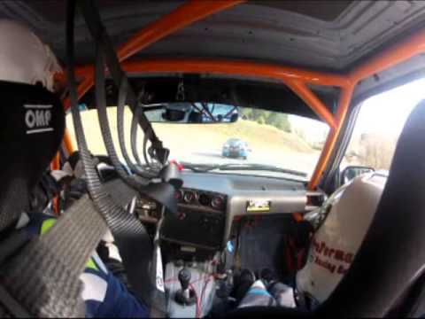 Simulated Racing - John Parker, BBQ2U #338, gives a young child a passenger seat experience in a simulated PRO3 race. The event was a fund raiser for Children's Hospital. Hoste...