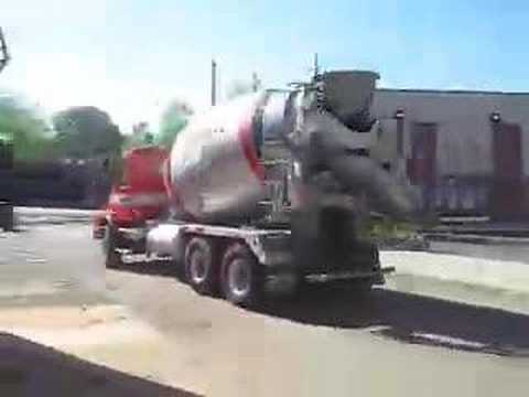 mixer - The BIG cement mixer comes rumbling down the street to the job site, where the workmen are waiting. Watch the cement come sliding down the chute while the me...