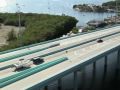 www.fla-keys.com The Florida Keys Overseas Highway, from just north of Key Largo to Key West, is now an All-American Road. The designation was announced Friday by Federal transportation officials, during a ceremony in Washington, DC The Keys highway is the only All-American Road in Florida. It's the highest recognition possible under the National Scenic Byways program established by the US Congress in 1991. Only 30 other roadways in the nation have earned the prestigious title. Originally completed in 1938, the Overseas Highway incorporates 42 bridges over the waters of the Atlantic Ocean, Florida Bay and the Gulf of Mexico. They include the Seven Mile Bridge at Marathon, which stretches 6.79 miles across open water and was referred to on its completion as 