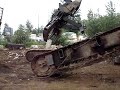 Loading Cat Tracks In an Overseas Container
