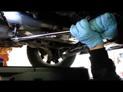 how to drain transmission fluid without dropping the pan