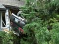 car crashes into house
