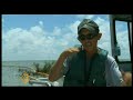 Oil spewing from BP's ruptured undersea well in the Gulf of Mexico has now reached the US coast, choking marshlands and fragile marine life. Amid the massive mop-up operation, Al Jazeera's John Terrett takes a boat ride around southern Louisiana's coast. The thick slick is already causing the local economy and the environment massive damage, but many fear the worst is yet to come. (May 22, 2010)