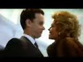 melanie griffith wearing a mink or sable from the movie bonfire. can't blame tom hanks for hugging her...