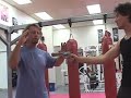 Jacov Bresler demonstrates a gun disarm