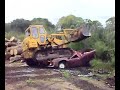 subaru pickup vs. 12 tonne komatsu...