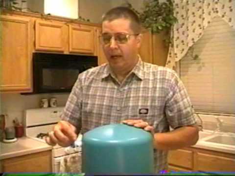 reverse osmosis - The number one reason for low water flow from a reverse osmosis system is due to the holding tank losing its air pressure. This video describes how to servic...