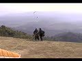 Three people, one paraglider