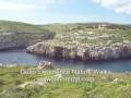 Mgarr ix-Xini bay and tower in Sannat Gozo