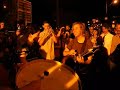 everybody gather round, get a slice of pizza, and sing along in the modified parking lot.