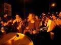 everybody gather round, get a slice of pizza, and sing along in the modified parking lot.