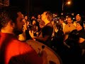 everybody gather round, get a slice of pizza, and sing along in the modified parking lot.