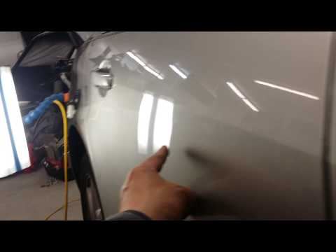 Paintless dent repair on 05 cadillac sts