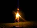 Samuel Tricking With Flaming Numchucks