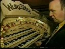 organist nigel ogden gives us a walking tour of the historic wurlitzer theatre organ at the tower ballroom, blackpool, england.  he shows us the process of starting up the organ and navigating through a maze of doorways to get to the console underneath the stage and raising it up to stage level, just as it has been done for decades.

  also included, a tribute and some rare archive film footage of organist reginald dixon. 

  the segments i've selected from this video were used by permission of valentine music ltd.
www.valentinemusic.co.uk

   the complete dvd titled 'the organist entertains' can be purchased from any of these suppliers:
www.soundandpicture.co.uk 
www.nostalgiadirect.com
www.organ.co.uk.

   part two which includes a tour of the organ and several more tunes performed by nigel is also available on my channel.