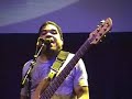 bass player oteil burbridge plays along as he sings the melody.