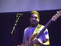 bass player oteil burbridge plays along as he sings the melody.