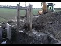 JCB excavator in dirty field