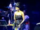Erykah Badu performs with drums at Massey Hall, Toronto