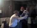 my brother & sister-in-law boxing on the wii for the first time. she gets a little excited when she knocks him down for the 10 count.