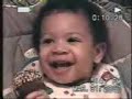 Serious Baby Pulling A Funny Frown And Laughing Serious Baby Pulling A Funny Frown And Laughing