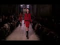 front row celebrities are a dime a dozen during fashion week, but when the world's most famous athlete is sitting next to anna wintour - even the weariest of cynics sit up and take note. funnily enough, en route to victoria beckham's autumn/winter 2012-13 show on sunday morning at the new york public library, one couldn't help but notice fifth avenue's h&m flagship plastered with images of soccer star david beckham in just his underwear - to promote his bodywear collection with the retailer. moments later, there was the real thing - albeit fully clothed in a dapper suit, sitting amongst the fashion cognoscenti, to cheer on his wife. that's certainly a lot of pre-show excitement, but the catwalk had its own set of delights to offer. beckham remained rooted in her very specific vision of dressing, simple and sexy, but added touches of military influences to beef up her lean signature silhouette. gone was the sportiness of last season?autumn/winter 2012-13 had a luxe sense of pragmatism. dresses were at the heart of this show, in stretched knits that hugged the body and stopped right above or just below the knee. there was a buttoned-up feel with dainty pointed collars hovering at the neckline of many of the pieces, shown in an array of army green, black, brown, orange, and sky blue. over time, beckham has displayed a knack for editing. her work never feels overwrought or flashy and she seems to know when something slight - like a row of gold buttons, an epaulet, or a  ... 