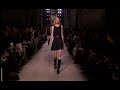 front row celebrities are a dime a dozen during fashion week, but when the world's most famous athlete is sitting next to anna wintour - even the weariest of cynics sit up and take note. funnily enough, en route to victoria beckham's autumn/winter 2012-13 show on sunday morning at the new york public library, one couldn't help but notice fifth avenue's h&m flagship plastered with images of soccer star david beckham in just his underwear - to promote his bodywear collection with the retailer. moments later, there was the real thing - albeit fully clothed in a dapper suit, sitting amongst the fashion cognoscenti, to cheer on his wife. that's certainly a lot of pre-show excitement, but the catwalk had its own set of delights to offer. beckham remained rooted in her very specific vision of dressing, simple and sexy, but added touches of military influences to beef up her lean signature silhouette. gone was the sportiness of last season?autumn/winter 2012-13 had a luxe sense of pragmatism. dresses were at the heart of this show, in stretched knits that hugged the body and stopped right above or just below the knee. there was a buttoned-up feel with dainty pointed collars hovering at the neckline of many of the pieces, shown in an array of army green, black, brown, orange, and sky blue. over time, beckham has displayed a knack for editing. her work never feels overwrought or flashy and she seems to know when something slight - like a row of gold buttons, an epaulet, or a  ... 