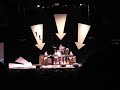 rain, as the beatles, the appearance on ed sullivan.  these guys were in beatlemania at the winter garden theater on broadway (nyc) in the 1970's.