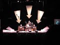 rain, as the beatles, the appearance on ed sullivan.  these guys were in beatlemania at the winter garden theater on broadway (nyc) in the 1970's.