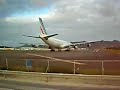 Airbus 340 taking off, blowing people off beach