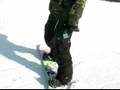 How to Do Snowboard Tricks at the Park : How to 50-50 a Snowboard on a Rainbow Box