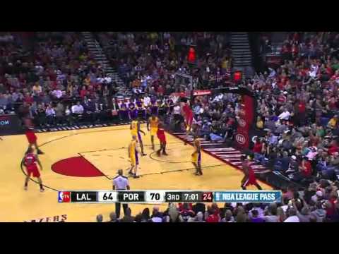 Nicolas Batum dunks over Dwight Howard