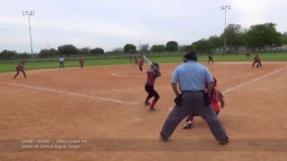 Gabby hits ball near the fence