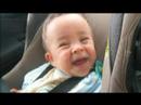 Baby laughing at his father, Ethan