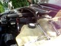How to remove the adjuster unit from a 2002 BMW E46 330i.