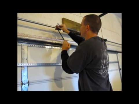 how to torsion spring garage door