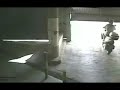 Motorrijder vs. garagedeur