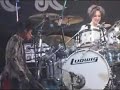 Toshiya playing drums