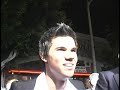 TA INTERVIEWS TAYLOR LAUTNER AT RED CARPET PREMIERE TA INTERVIEWS TAYLOR LAUTNER AT RED CARPET PREMIERE