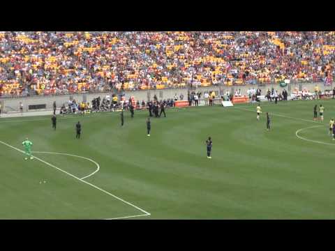 Fans invade pitch and take selfies with Balotelli at International Champions Cup match.