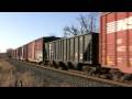 HD Available: January 3, 2009: Trains 33A, 15T, 20G, and 10N. 33A at HP 77.7 near the 78 signal with power: NS D9-40CW 9818 NS ES40DC 7518 NS GP38-2 5220 NS GP38-2 5246 NS SW1001 2104 (built for Reading) The 79.9 detector can be heard. 15T comes west at HP 77.5 night with all GE power and a MoW yard cleaner. 20G heads east through the same crossing with: NS SD50 5436 