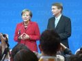 Victorious Merkel vows to lead Germany out of slump