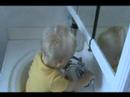 Luca playing in the bathroom sink