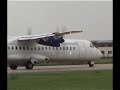 aircraft landing on runway 14 in the rain