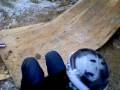 Scooter on a half pipe