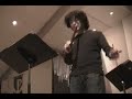 Japanese quena flute player in concert 1; ethnic world music