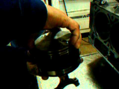 Installing a piston with rings in to a 6.2 Cadillac engine