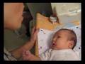 Baby Natalie talking with Gramma Tong